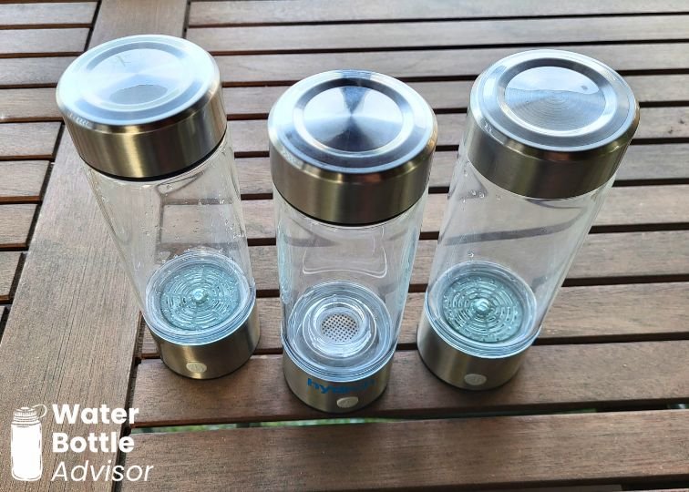 Three nearly identical generic hydrogen water bottles shown side by side