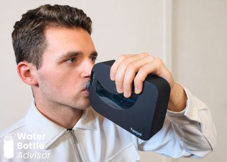 Jeremiah Kowalski drinking from the Piurify Flask hydrogen water bottle