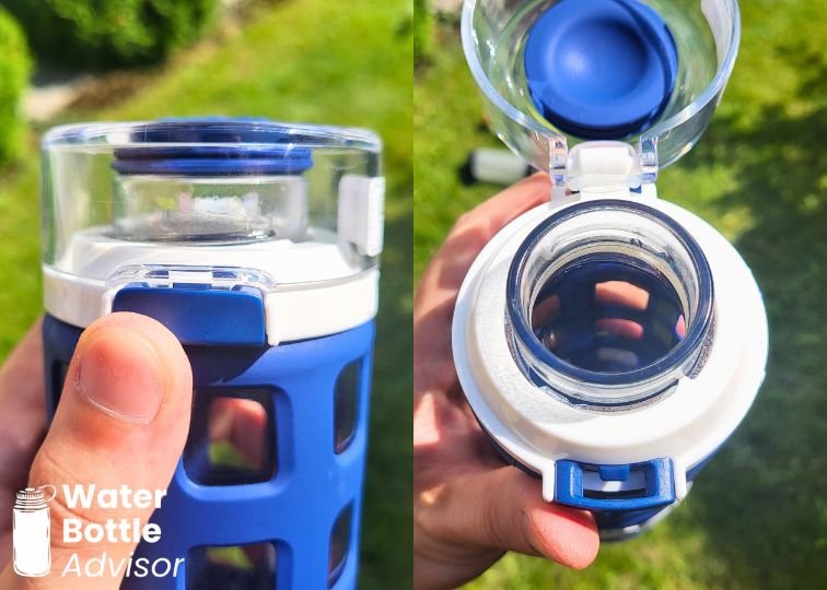Close-up of the Ello Syndicate glass water bottle push-button lid showing the open drinking spout
