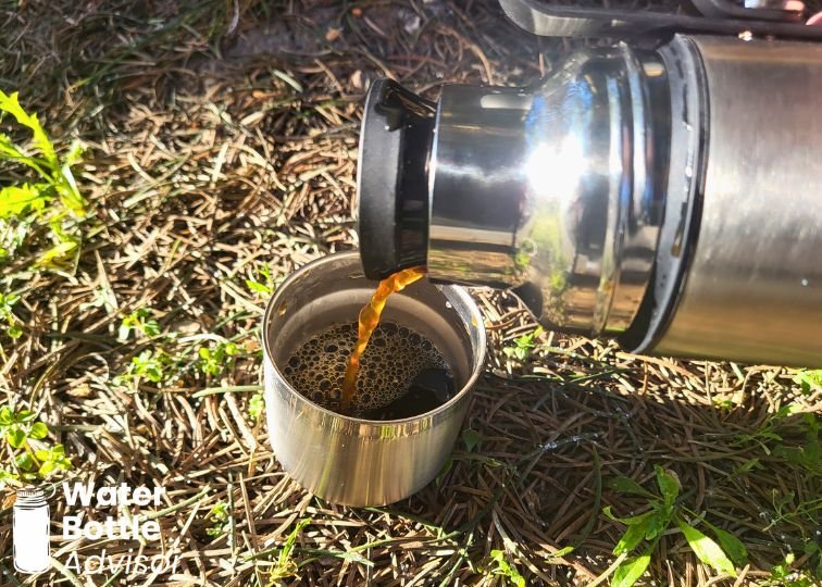 Hydro Flask Hot Flask & Cup 36 oz pouring coffee into the cup using the pour-through lid