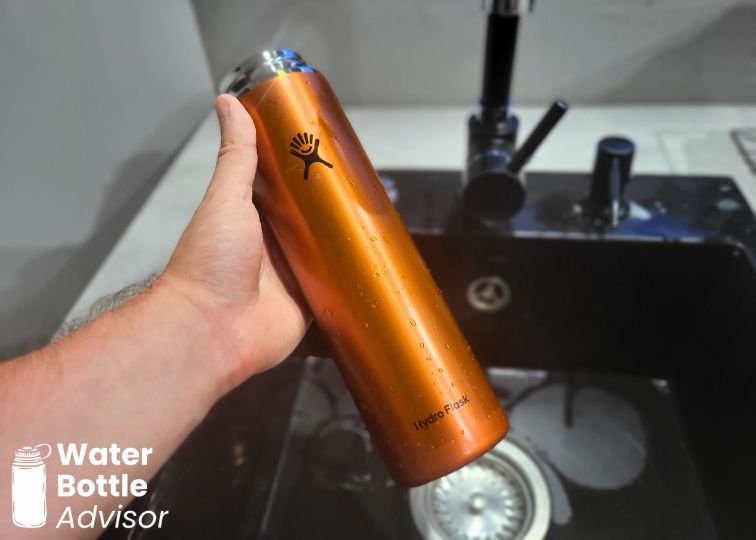 Hydro Flask Trail Series Lightweight 24 oz bottle being washed in a kitchen sink