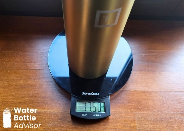 Iron Flask 40 oz bottle on a kitchen scale showing a weight of 17.50 oz