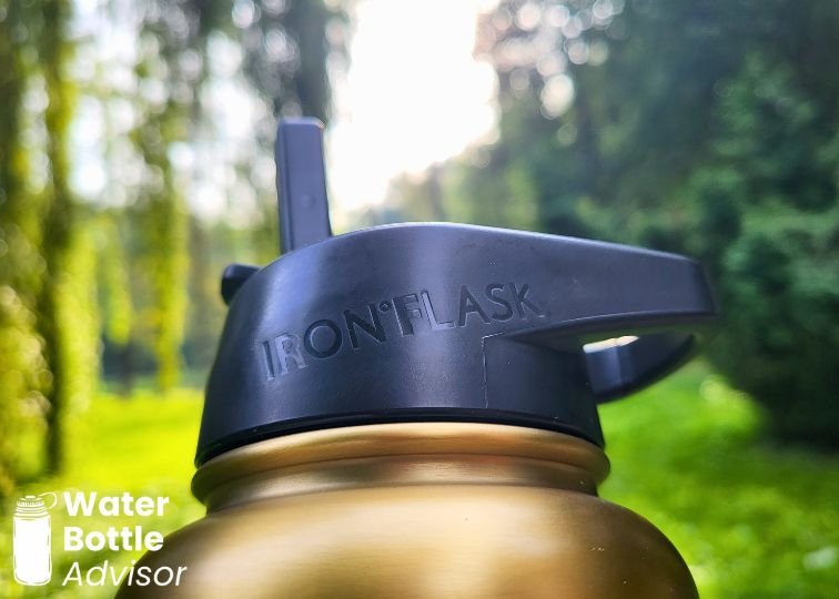 Close-up of the Iron Flask logo embossed on the bottle lid