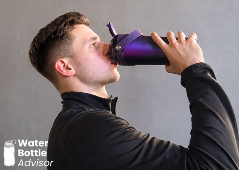 Jeremiah Kowalski drinking from the BrüMate MultiShaker bottle indoors