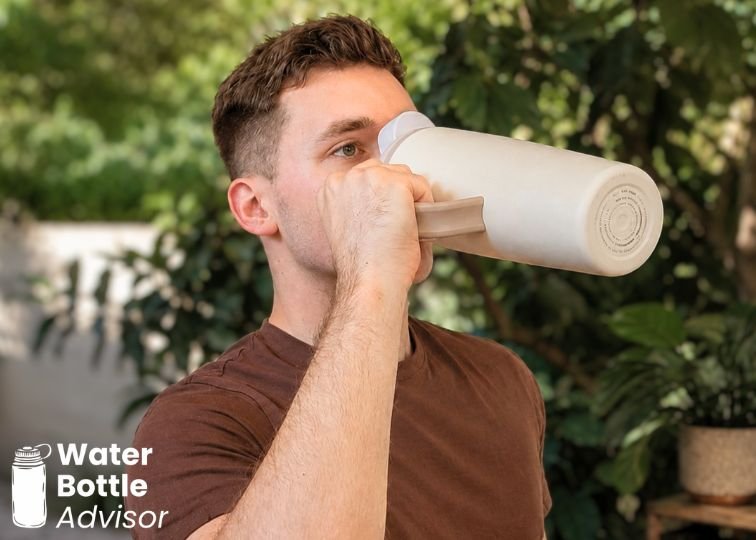 Jeremiah Kowalski drinking from the Owala FreeSip Tumbler 30 oz outdoors