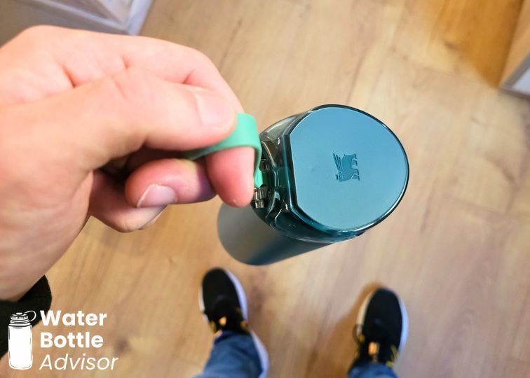 Stanley FlowState Spring Bottle 20 oz being carried by its loop