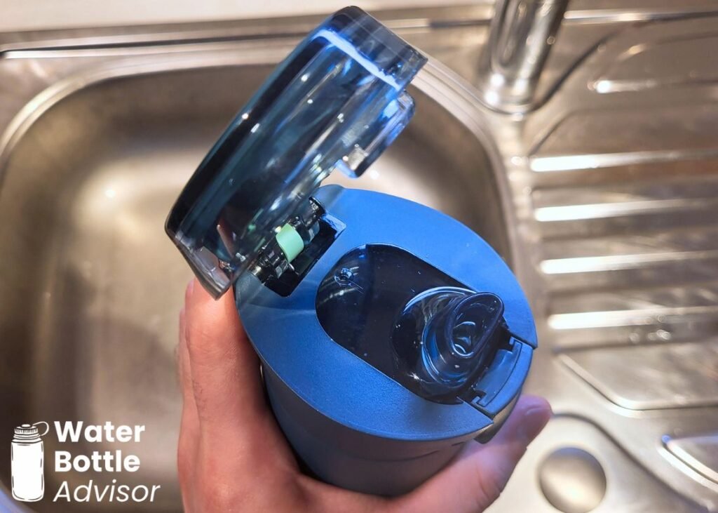Close-up of the Stanley FlowState Spring Bottle 20 oz showing the drinking spout with the lid open