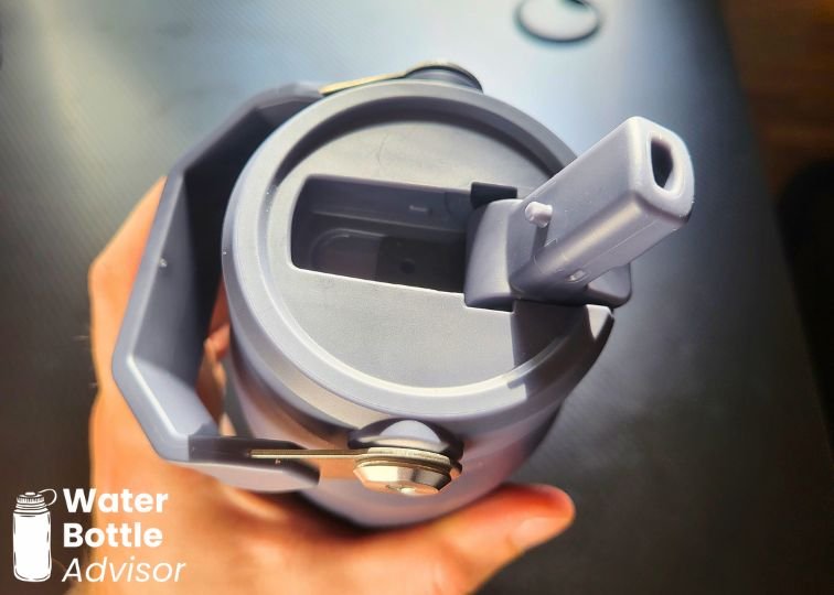 Close-up of the Stanley IceFlow 24 oz bottle lid showing the flip-up drinking spout