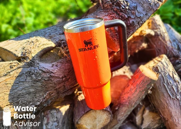 Stanley Quencher H2.0 FlowState 30 oz tumbler placed on logs during durability testing