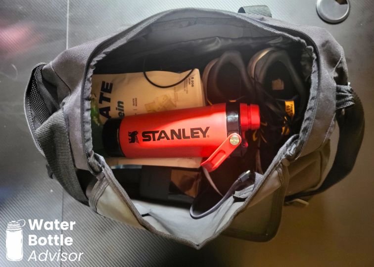 Stanley Vitalize Shaker Bottle packed inside a gym bag with workout gear
