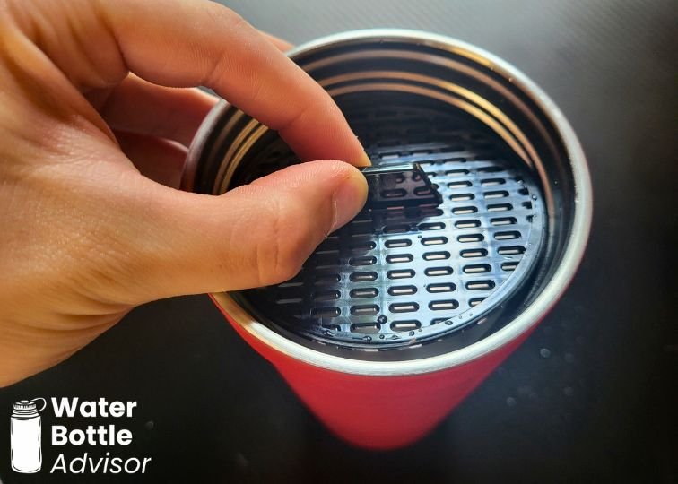 Close-up of the Stanley Vitalize Shaker Bottle showing the removable strainer insert