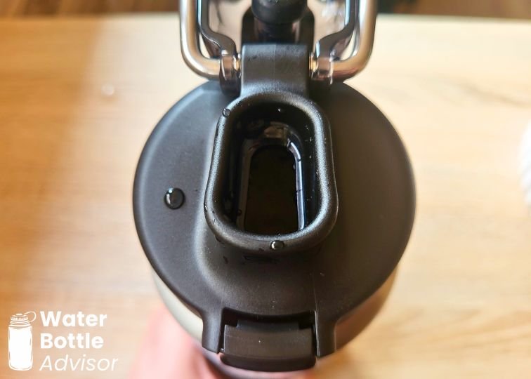 Close-up of the Stanley Wellspring 24 oz bottle showing the drinking spout with the lid open