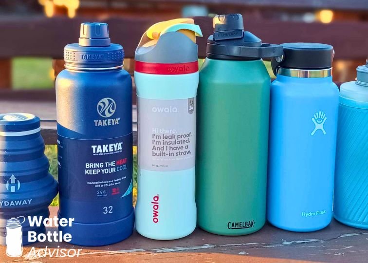 Takeya, Owala, CamelBak, and Hydro Flask reusable water bottles lined up outdoors for comparison
