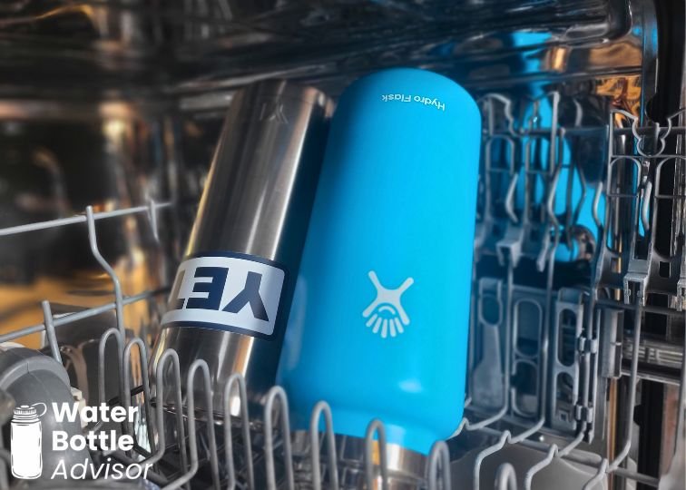 YETI Rambler 26 oz and Hydro Flask 32 oz bottles placed upside down in a dishwasher rack