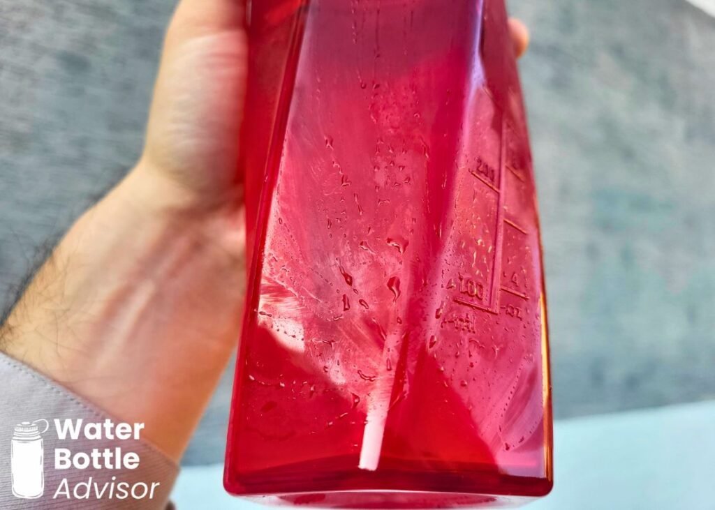 Close-up of the YETI Yonder shaker bottle filled with a cold drink and covered in condensation